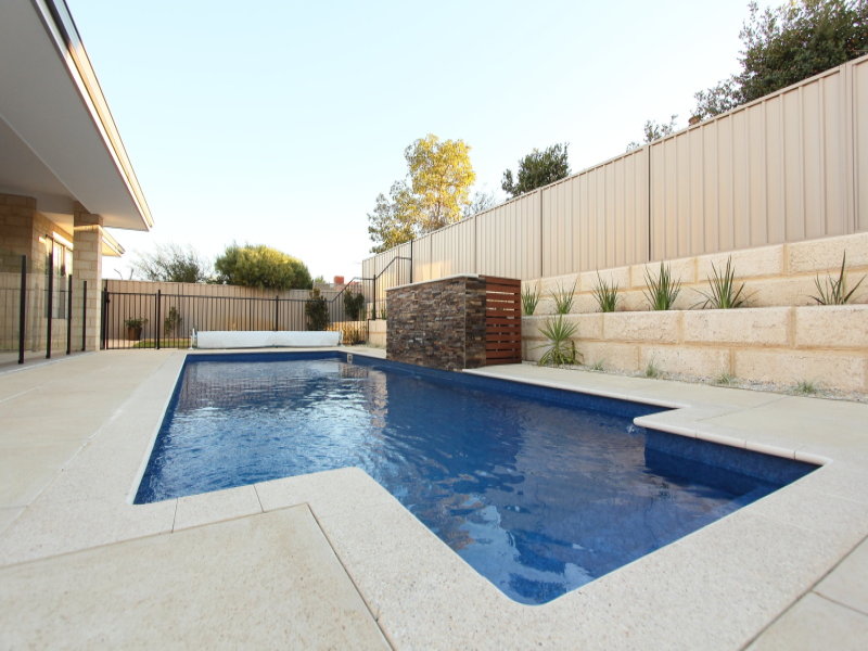 In-ground Pool Design Using Brick With Decking & Hedging - Pool Photo 